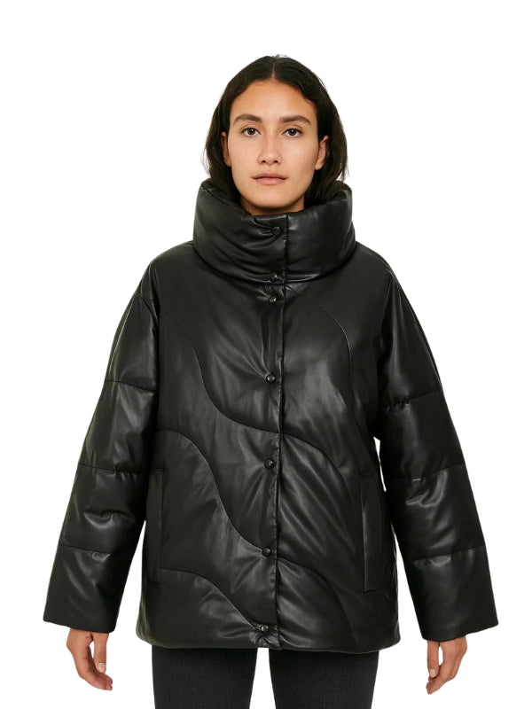 Person wearing a black puffer jacket on a white background