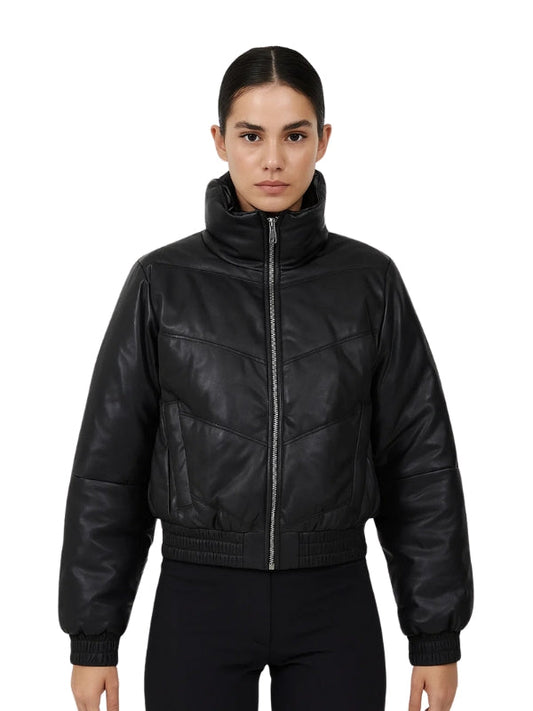 Person wearing a black leather bomber jacket on a white background