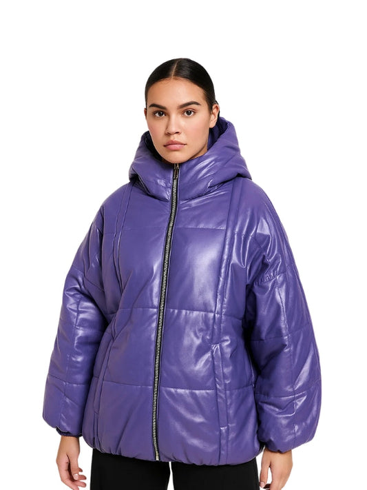 Woman wearing a purple puffer jacket on a white background